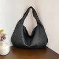 Elegante geflochtene Tasche für Damen | Brehn